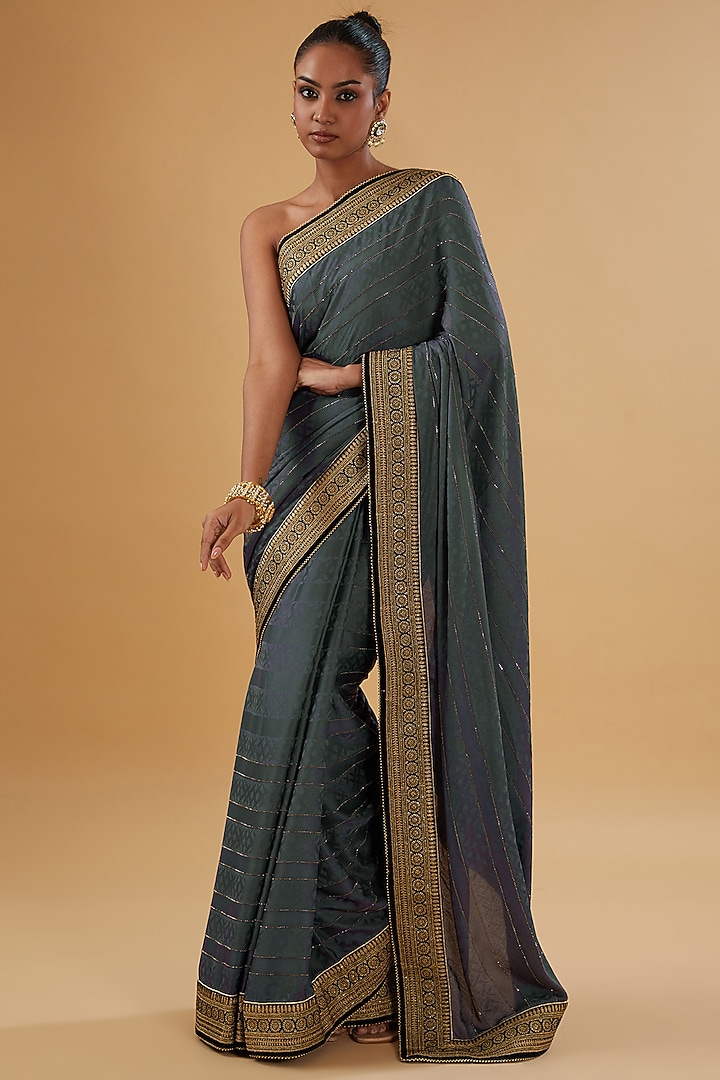 Iron Grey Crepe Floral Printed & Swarovski Embroidered Woven Festive Saree Set by NARMADESHWARI at Pernia's Pop Up Shop