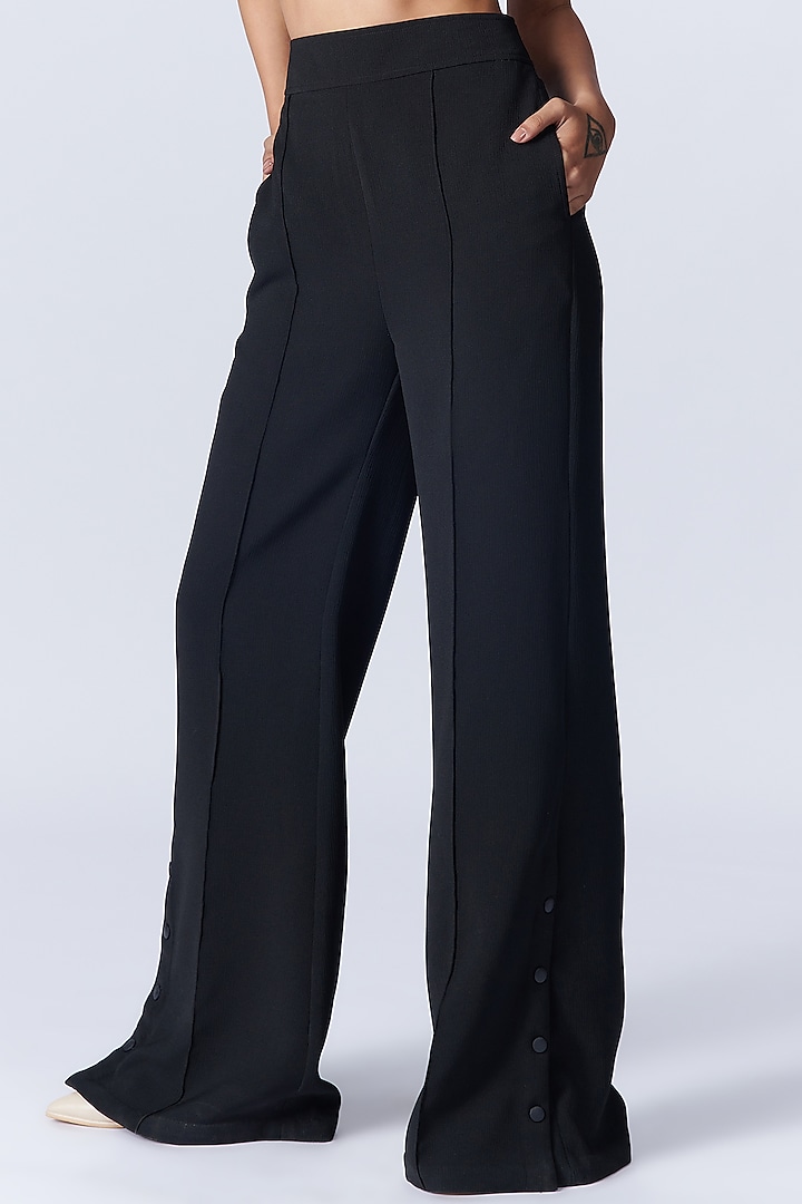 Herlom Flare Trousers in Black –