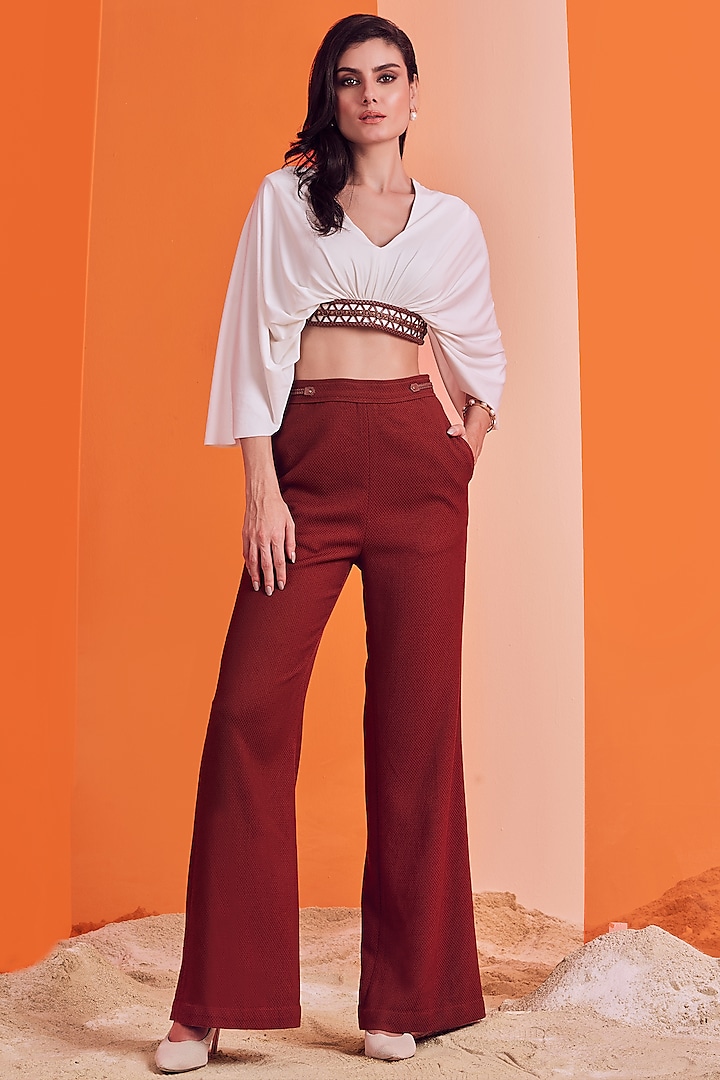 Rust Poly Jersey Flared Trousers by S&N by Shantnu Nikhil