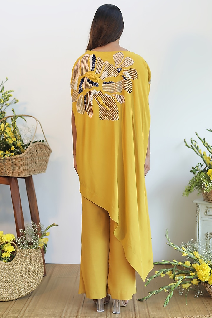 Mustard Embroidered Asymmetrical Kurta Set by Nayantara Couture at Pernia's Pop Up Shop
