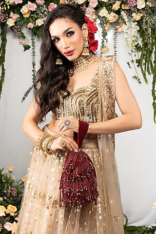 Maroon Velvet Crystal Tassel & Beaded Potli by Nayaab by Sonia