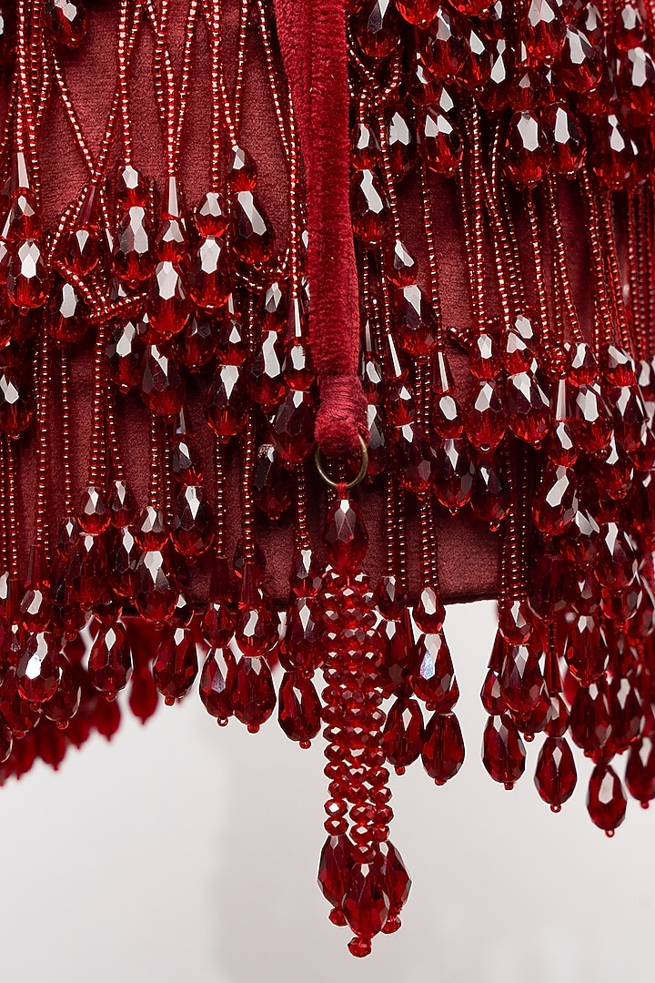 Maroon Velvet Crystal Tassel & Beaded Potli by Nayaab by Sonia at Pernia's Pop Up Shop