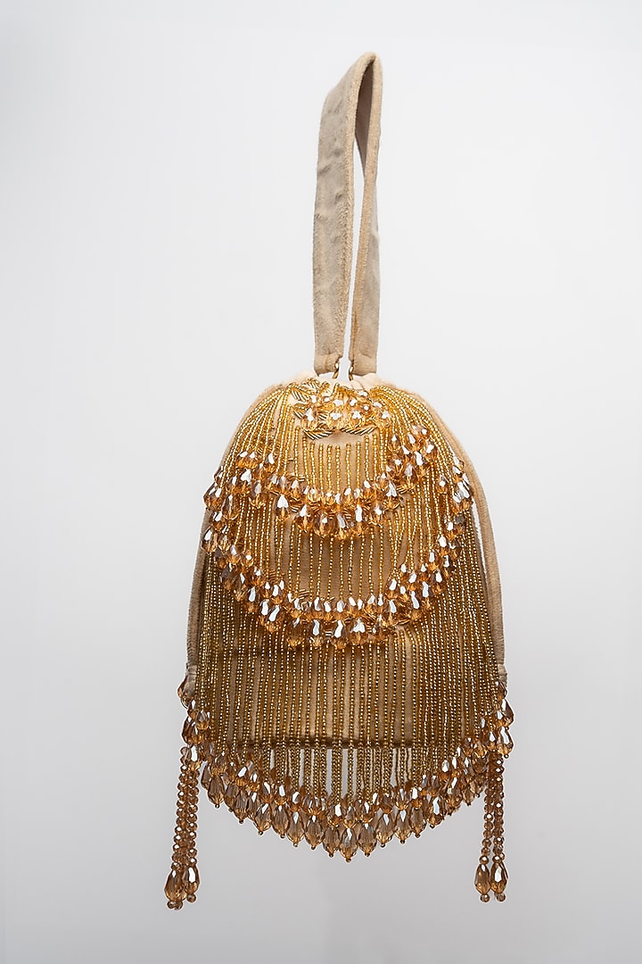 Gold Velvet Crystal Tassel & Beaded Potli by Nayaab by Sonia at Pernia's Pop Up Shop