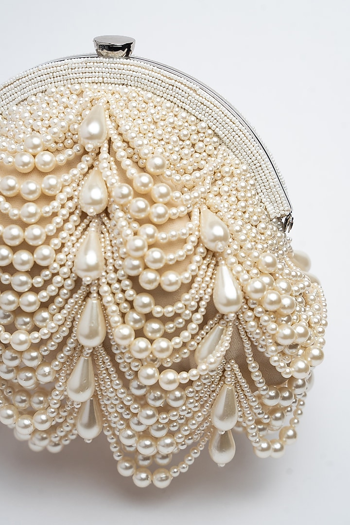 Off-White Suede Pearl & Bead Work Clutch by Nayaab by Sonia at Pernia's Pop Up Shop