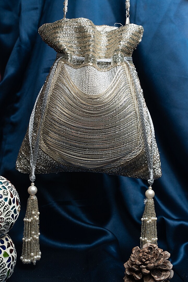 Gold & Silver Silk Metallic Chain Work Potli by Nayaab by Sonia