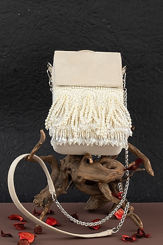 Ivory Suede Pearl Work Handbag by Nayaab by Sonia