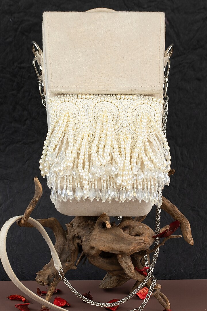 Ivory Suede Pearl Work Handbag by Nayaab by Sonia at Pernia's Pop Up Shop