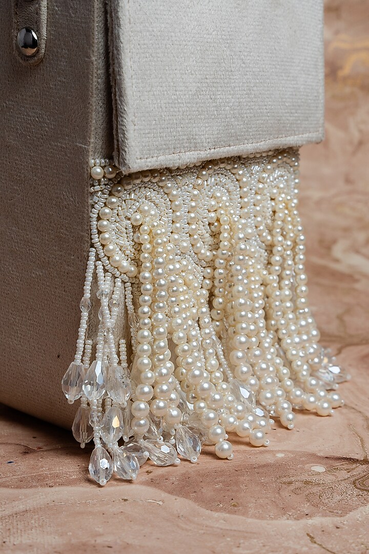 Ivory Suede Pearl Work Handbag by Nayaab by Sonia at Pernia's Pop Up Shop