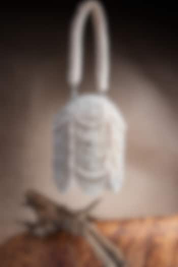 Off-White Suede Pearl Work Potli by Nayaab by Sonia at Pernia's Pop Up Shop