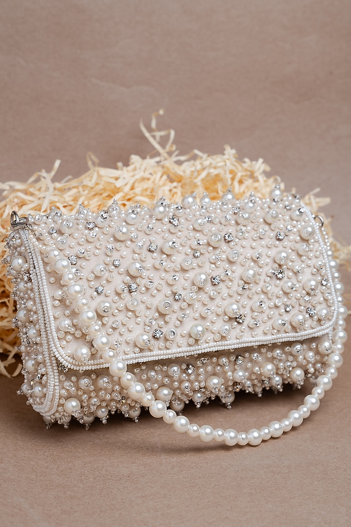 Ivory Suede Bead Work Clutch by Nayaab by Sonia at Pernia's Pop Up Shop
