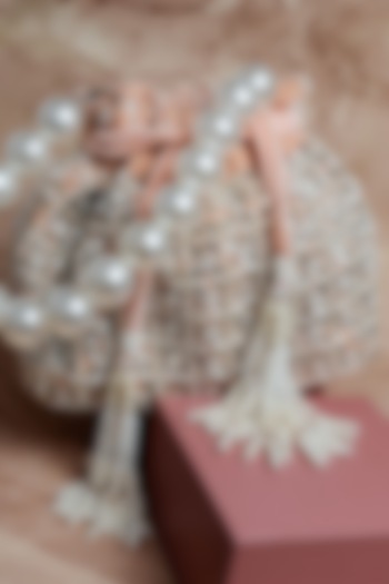 Blush Pink Velvet Pearl Work Potli by Nayaab by Sonia at Pernia's Pop Up Shop