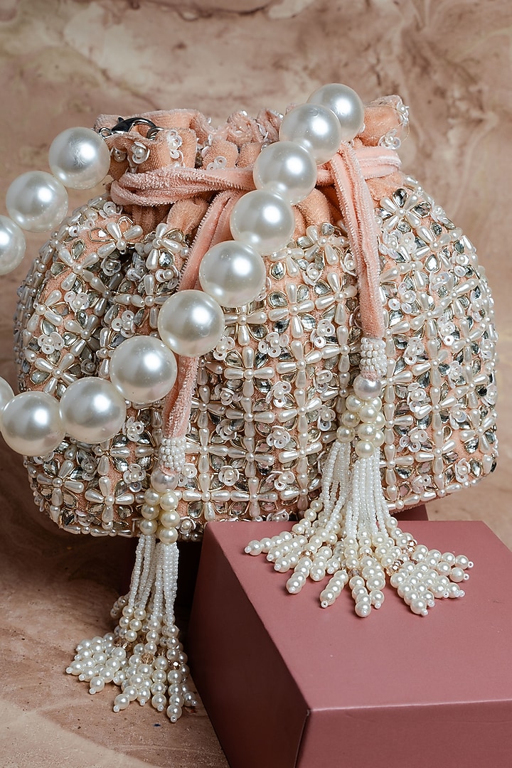 Blush Pink Velvet Pearl Work Potli by Nayaab by Sonia at Pernia's Pop Up Shop