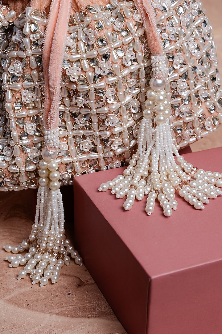 Blush Pink Velvet Pearl Work Potli by Nayaab by Sonia at Pernia's Pop Up Shop