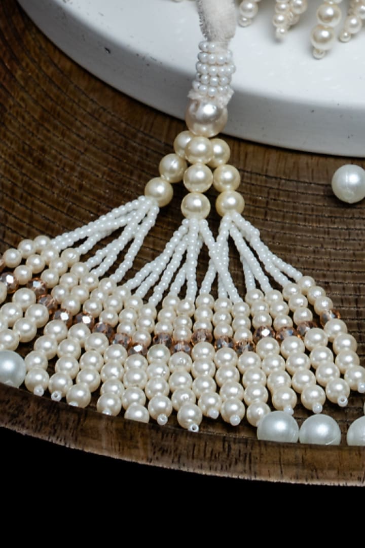 White Suede Pearl Work Potli by Nayaab by Sonia at Pernia's Pop Up Shop