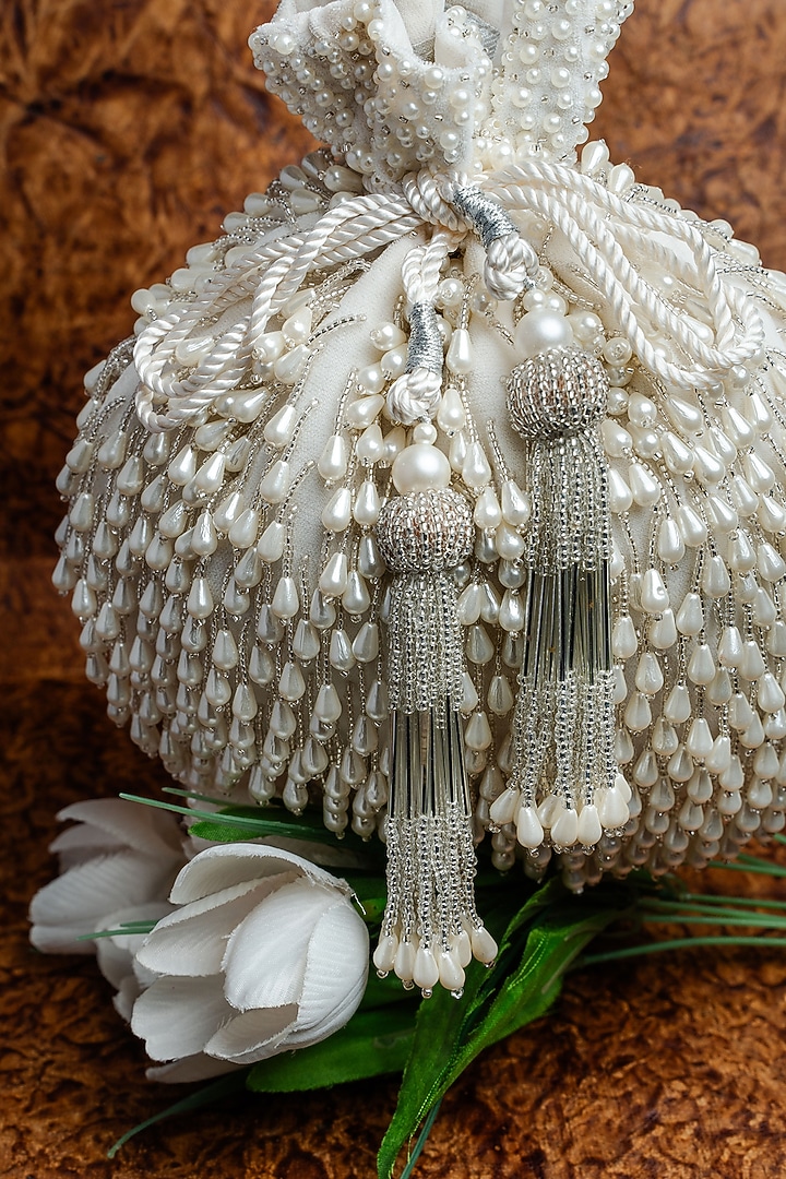 White Suede Pearl Work Potli by Nayaab by Sonia at Pernia's Pop Up Shop