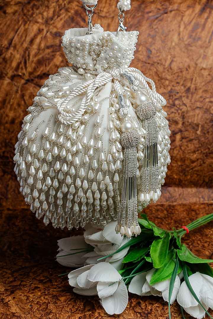 White Suede Pearl Work Potli by Nayaab by Sonia at Pernia's Pop Up Shop