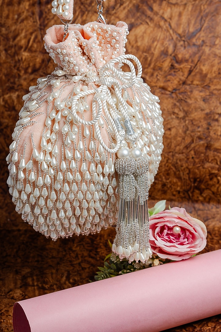Blush Pink Suede Pearl Work Potli by Nayaab by Sonia at Pernia's Pop Up Shop