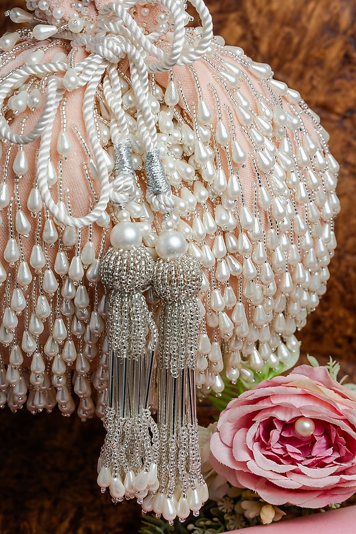 Blush Pink Suede Pearl Work Potli by Nayaab by Sonia at Pernia's Pop Up Shop