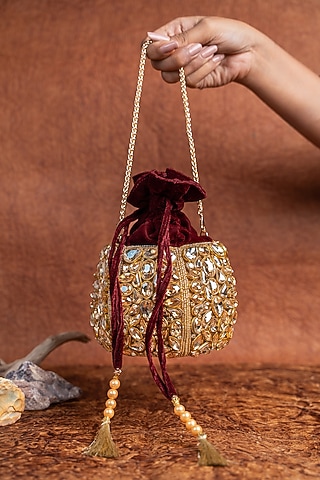Maroon Silk Kundan Embroidered Bucket Bag by Nayaab by Sonia