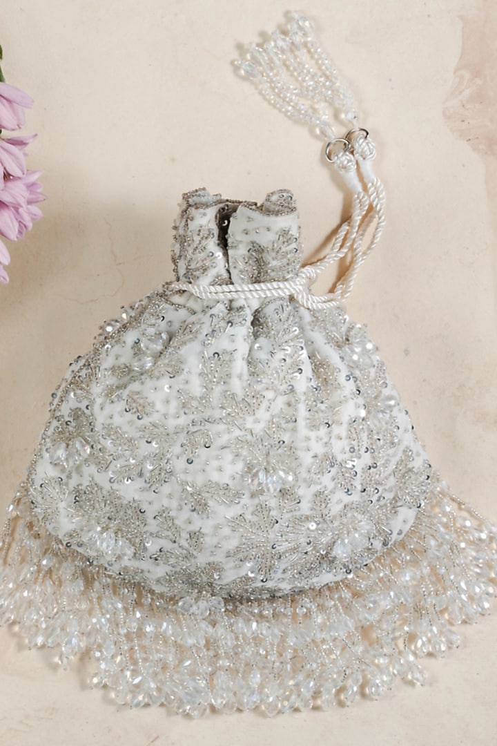 Silverish White Silk Sequins Embroidered Potli by Nayaab by Sonia at Pernia's Pop Up Shop