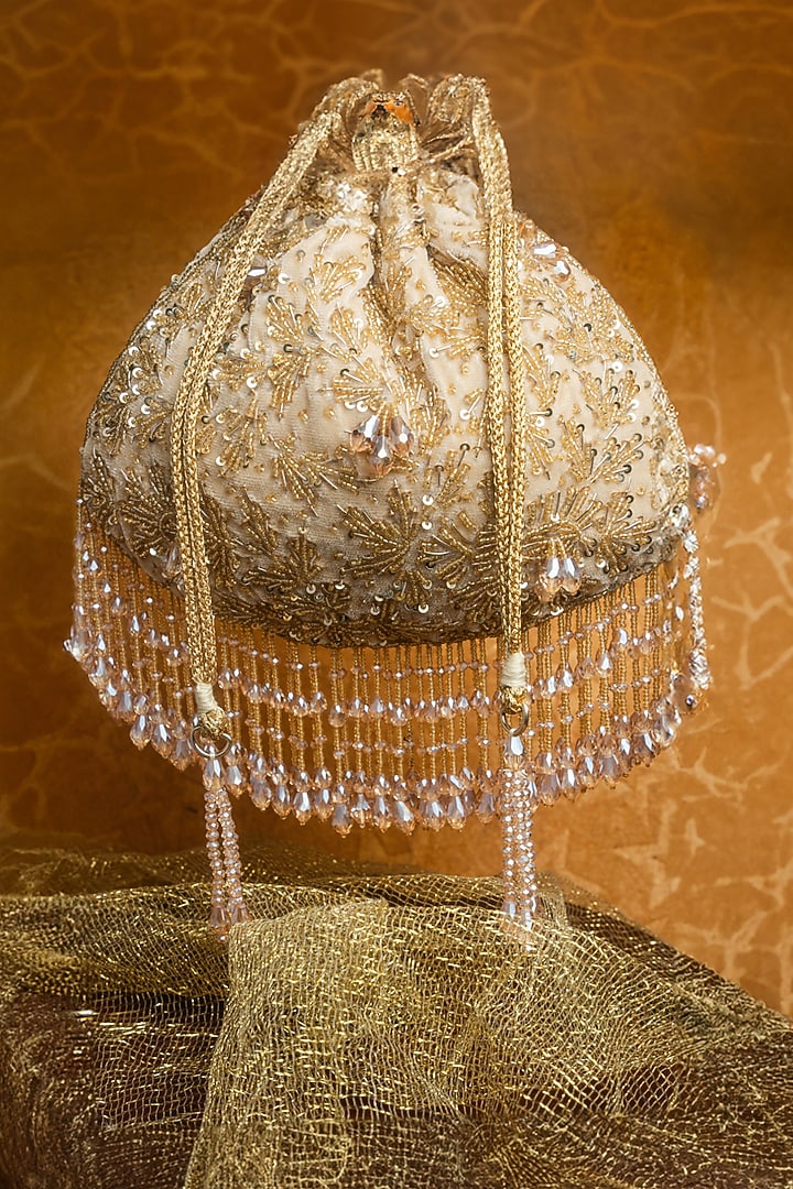 Gold Silk Sequins Embroidered Potli by Nayaab by Sonia at Pernia's Pop Up Shop