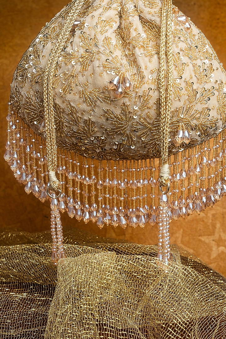 Gold Silk Sequins Embroidered Potli by Nayaab by Sonia at Pernia's Pop Up Shop