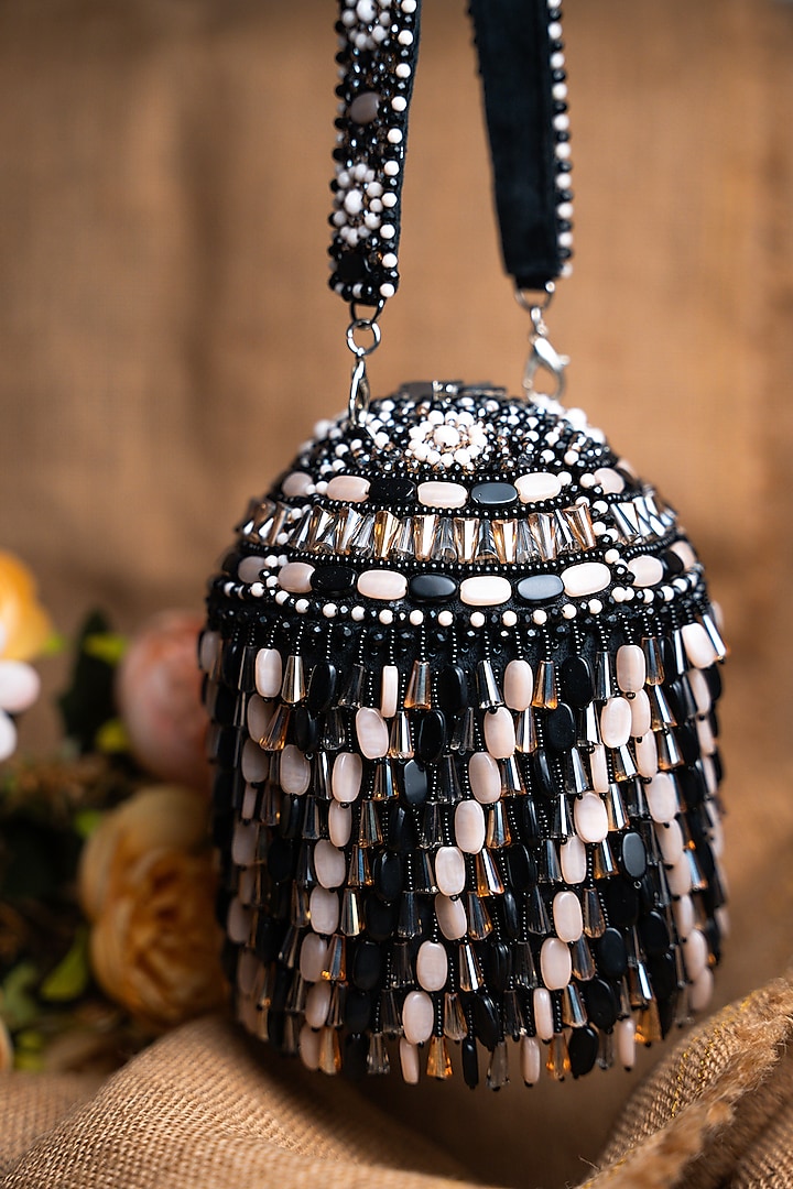 Black & Off-White Suede Bead Work Potli by Nayaab by Sonia at Pernia's Pop Up Shop