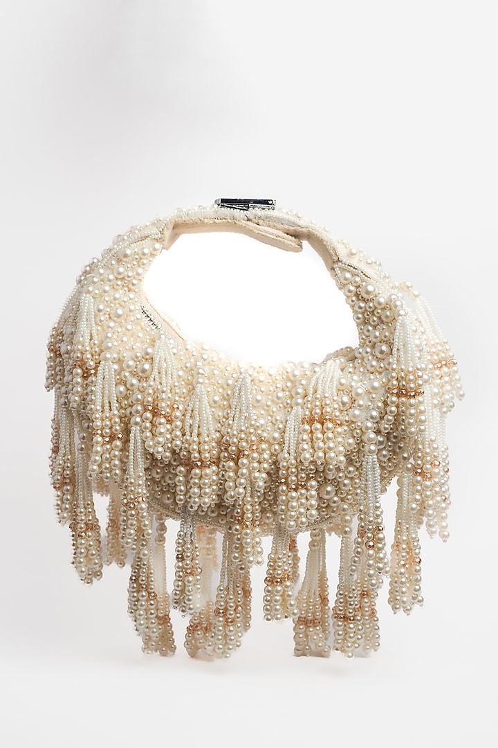 Off-White Suede Pearl & Beaded Potli by Nayaab by Sonia at Pernia's Pop Up Shop