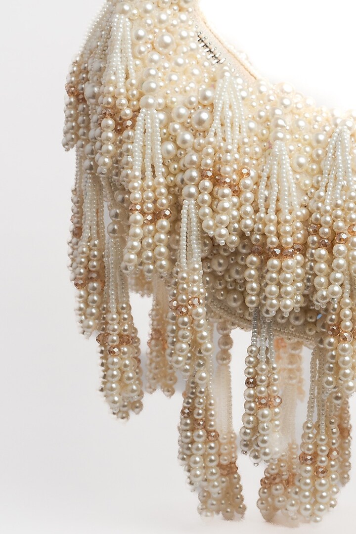 Off-White Suede Pearl & Beaded Potli by Nayaab by Sonia at Pernia's Pop Up Shop