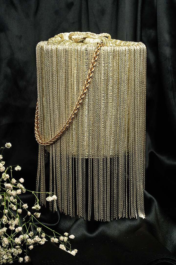 Light Gold Silk Metallic Chain Tassel Potli by Nayaab by Sonia at Pernia's Pop Up Shop