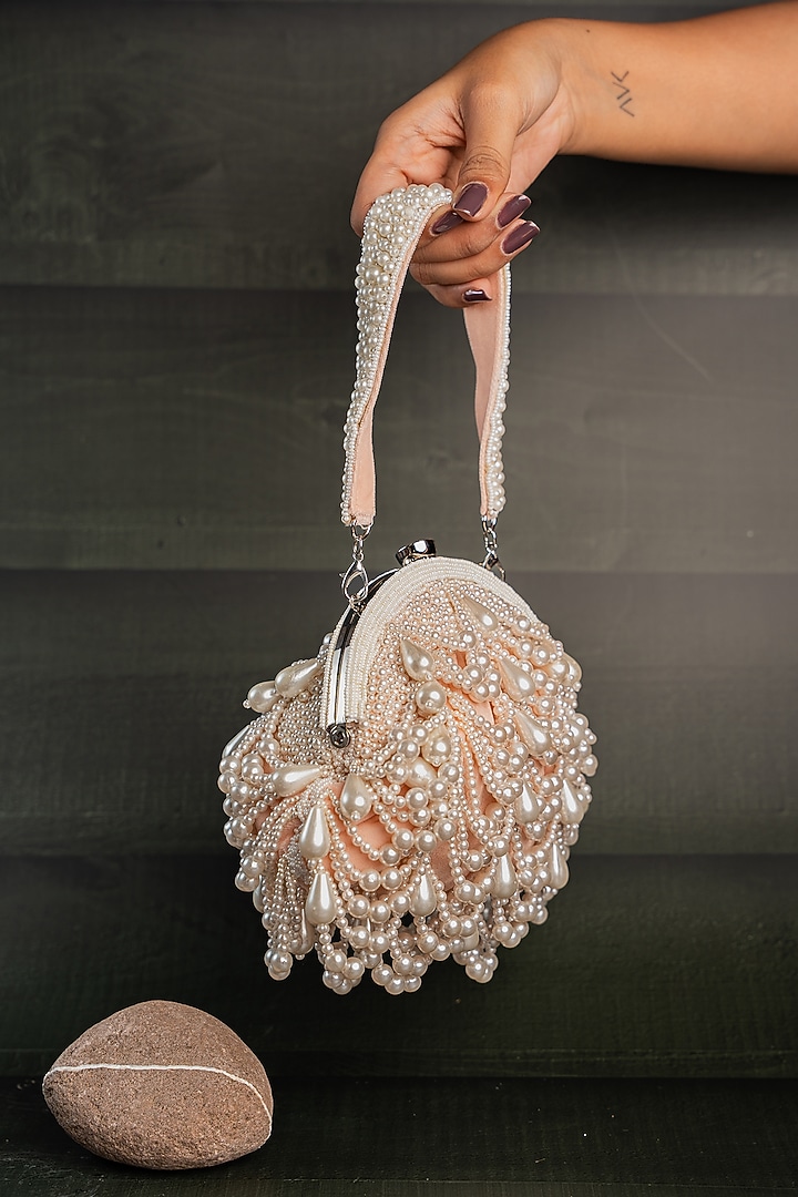 Pink Suede Pearl & Bead Work Potli by Nayaab by Sonia at Pernia's Pop Up Shop