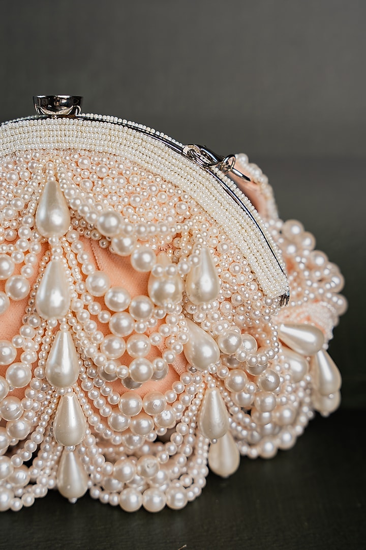 Pink Suede Pearl & Bead Work Potli by Nayaab by Sonia at Pernia's Pop Up Shop