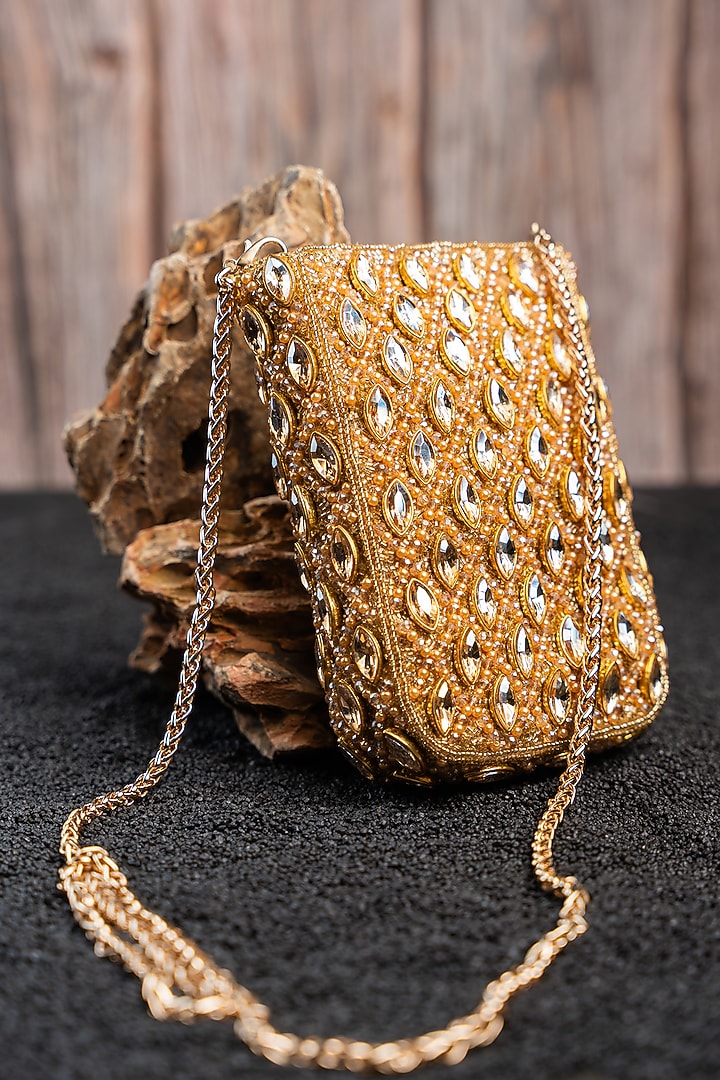 Gold Silk Kundan & Bead Embroidered Pouch by Nayaab by Sonia at Pernia's Pop Up Shop