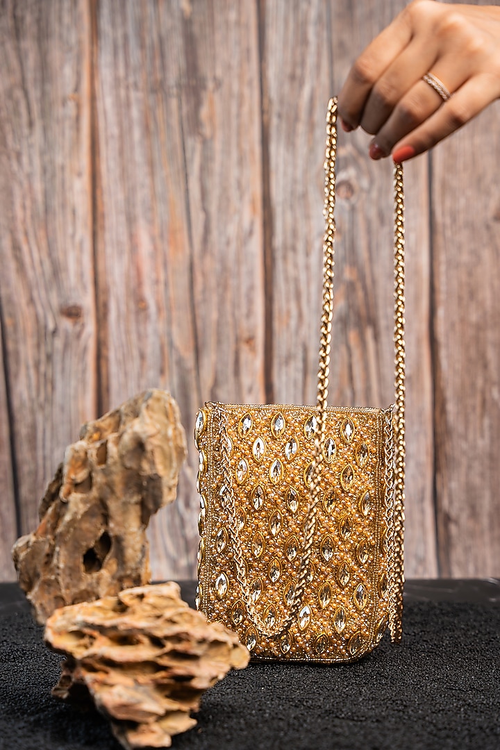 Gold Silk Kundan & Bead Embroidered Pouch by Nayaab by Sonia at Pernia's Pop Up Shop
