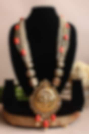 Gold Finish Coral Beaded & Jadau Temple Long Necklace by Nayaab by Sonia