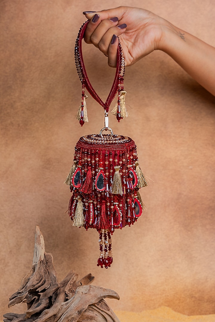 Maroon Velvet Mirror Embroidered Cylindrical Bag by Nayaab by Sonia at Pernia's Pop Up Shop
