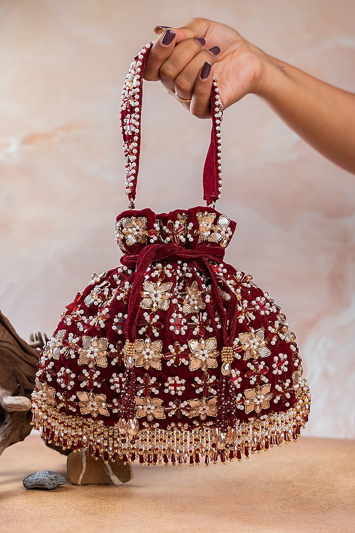 Ruby Red Velvet Floral Embellished Potli Bag by Nayaab by Sonia at Pernia's Pop Up Shop