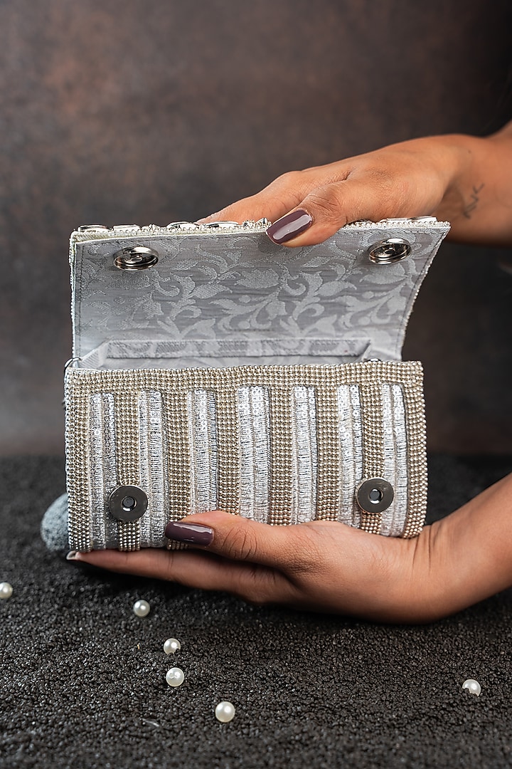 Silver Silk Floral Embellished Clutch by Nayaab by Sonia at Pernia's Pop Up Shop