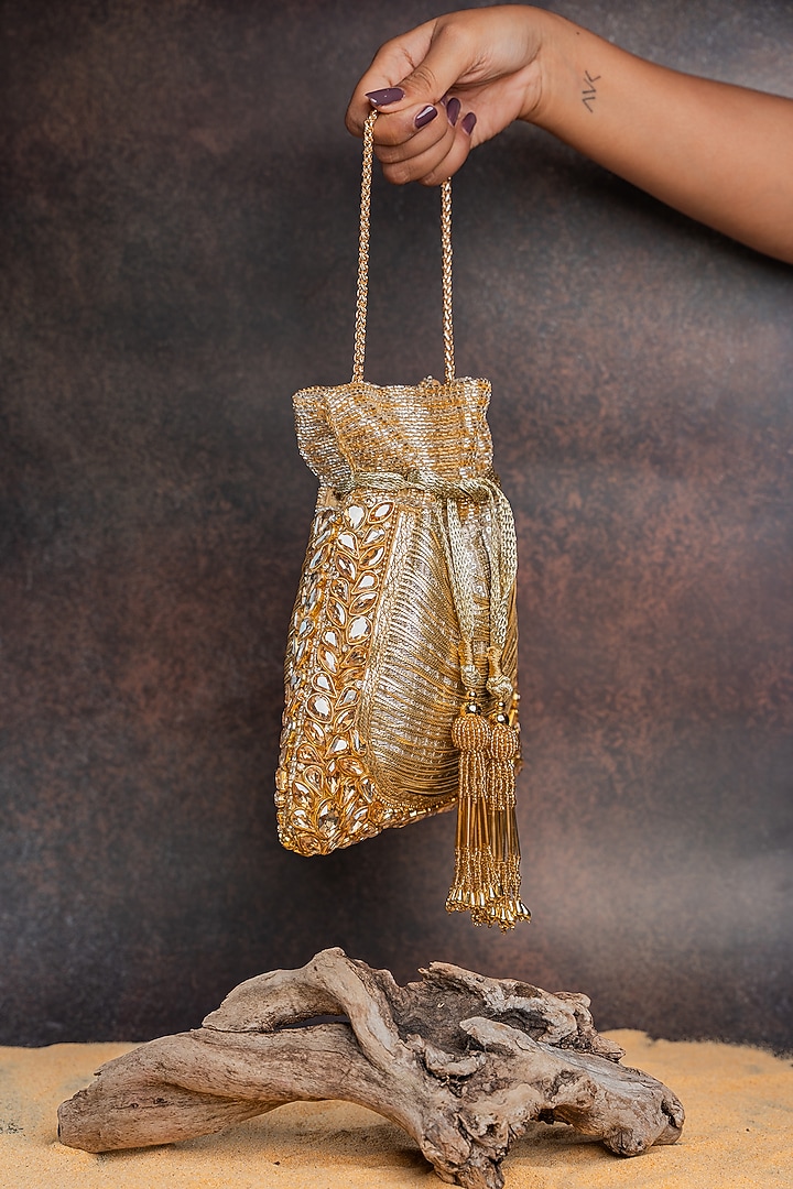 Gold Silk Cutdana Embellished Potli Bag by Nayaab by Sonia at Pernia's Pop Up Shop