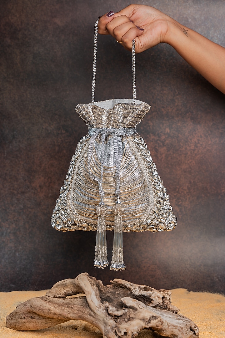 Silver Silk Cutdana Embellished Potli Bag by Nayaab by Sonia at Pernia's Pop Up Shop