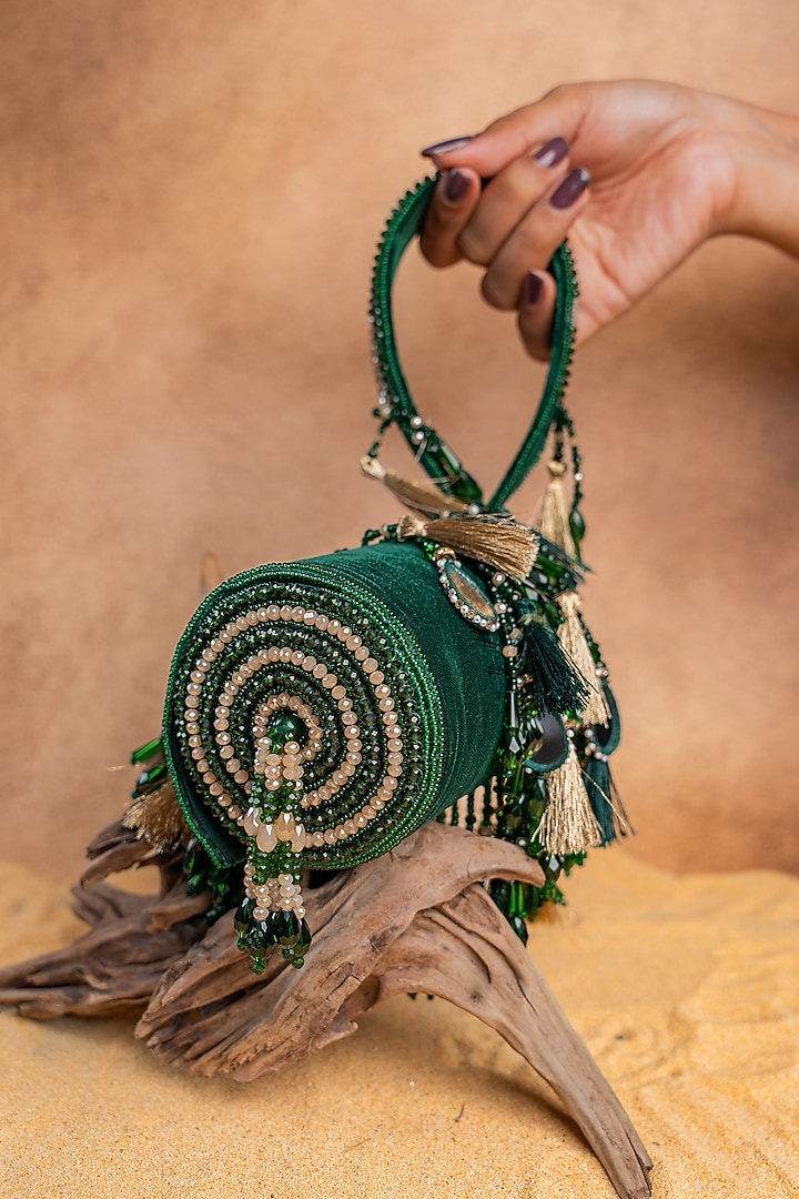 Green Velvet Mirror Work Cylindrical Bag by Nayaab by Sonia at Pernia's Pop Up Shop