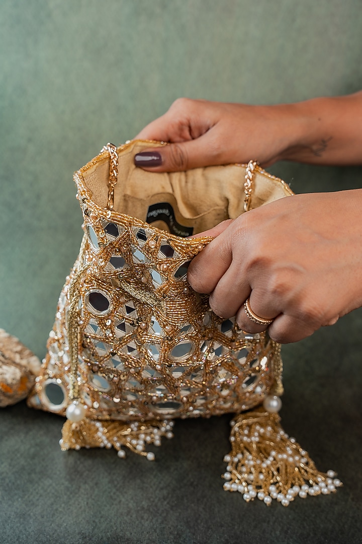 Gold Silk Mirror Embellished Potli by Nayaab by Sonia at Pernia's Pop Up Shop