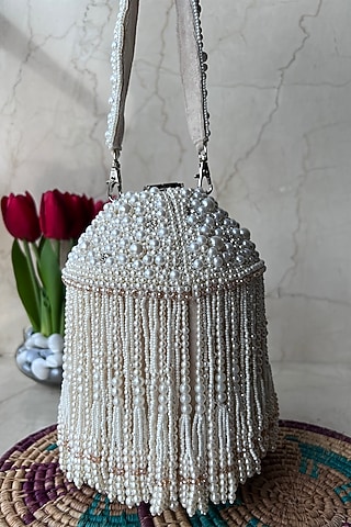 Off-White Suede Embroidered Potli by Nayaab by Sonia
