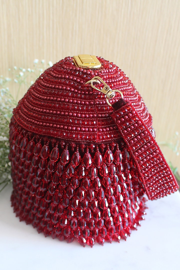 Maroon Suede Embroidered Potli by Nayaab by Sonia at Pernia's Pop Up Shop