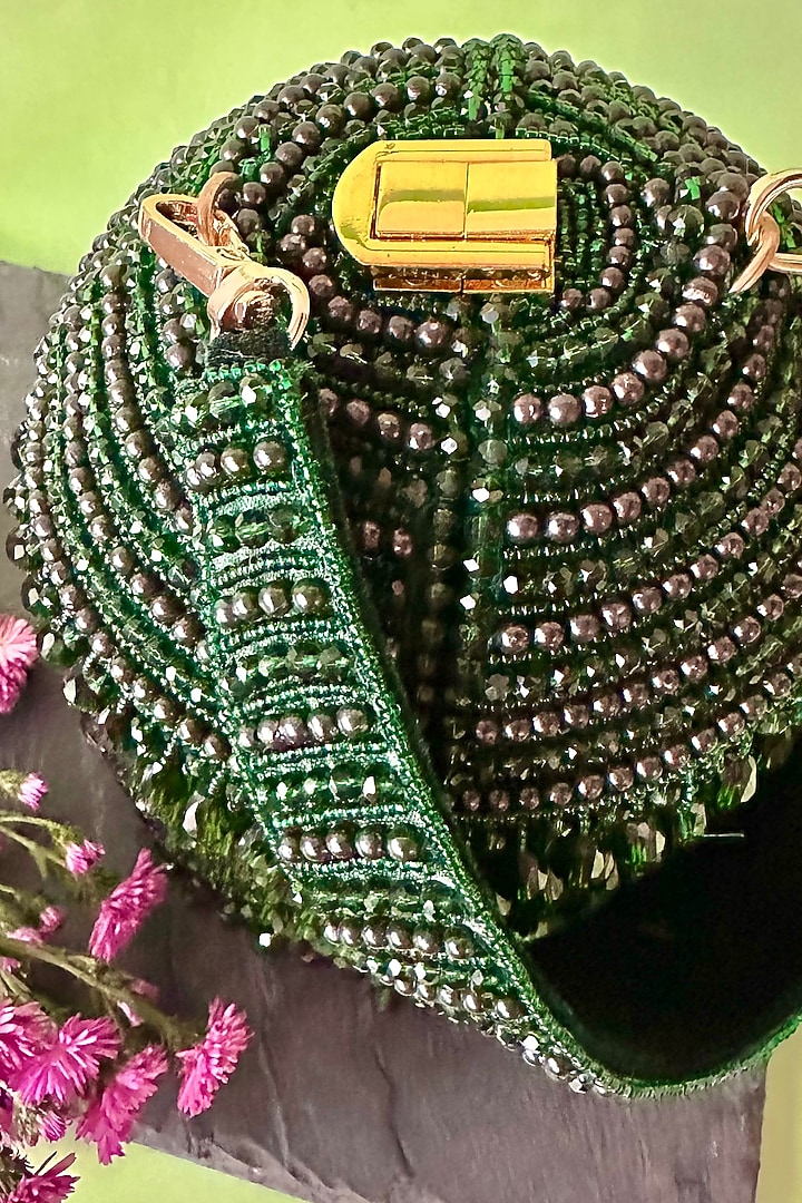 Green Suede Crystal & Tassel Embroidered Potli by Nayaab by Sonia at Pernia's Pop Up Shop