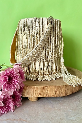 Light Gold Silk Pearl Tassel Embroidered Potli by Nayaab by Sonia