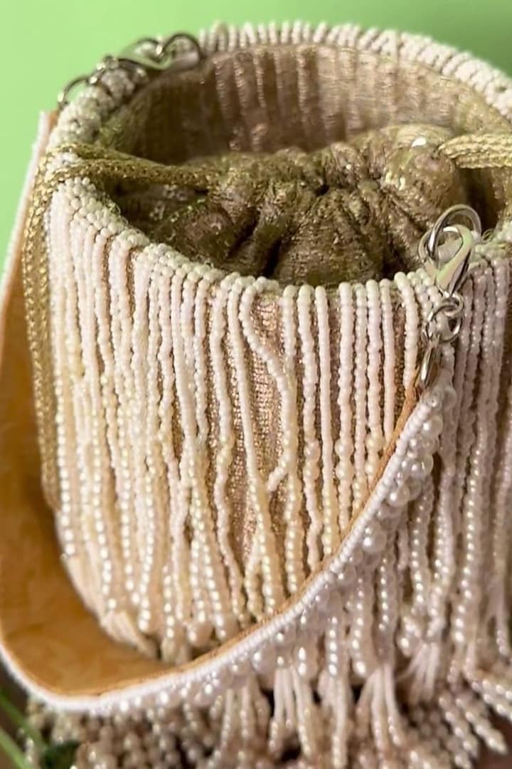 Light Gold Silk Pearl Tassel Embroidered Potli by Nayaab by Sonia at Pernia's Pop Up Shop
