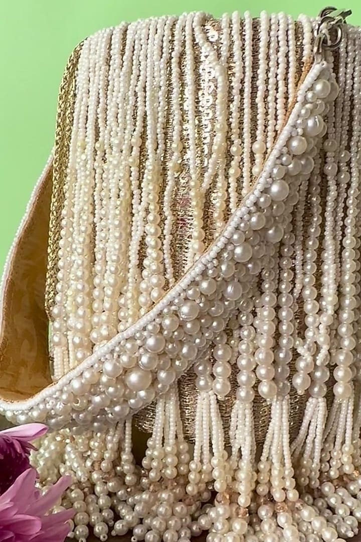 Light Gold Silk Pearl Tassel Embroidered Potli by Nayaab by Sonia at Pernia's Pop Up Shop
