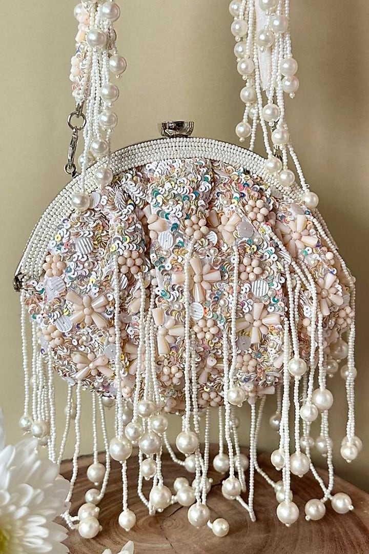 Off-White Silk Sequin & Bead Embroidered Clutch by Nayaab by Sonia at Pernia's Pop Up Shop