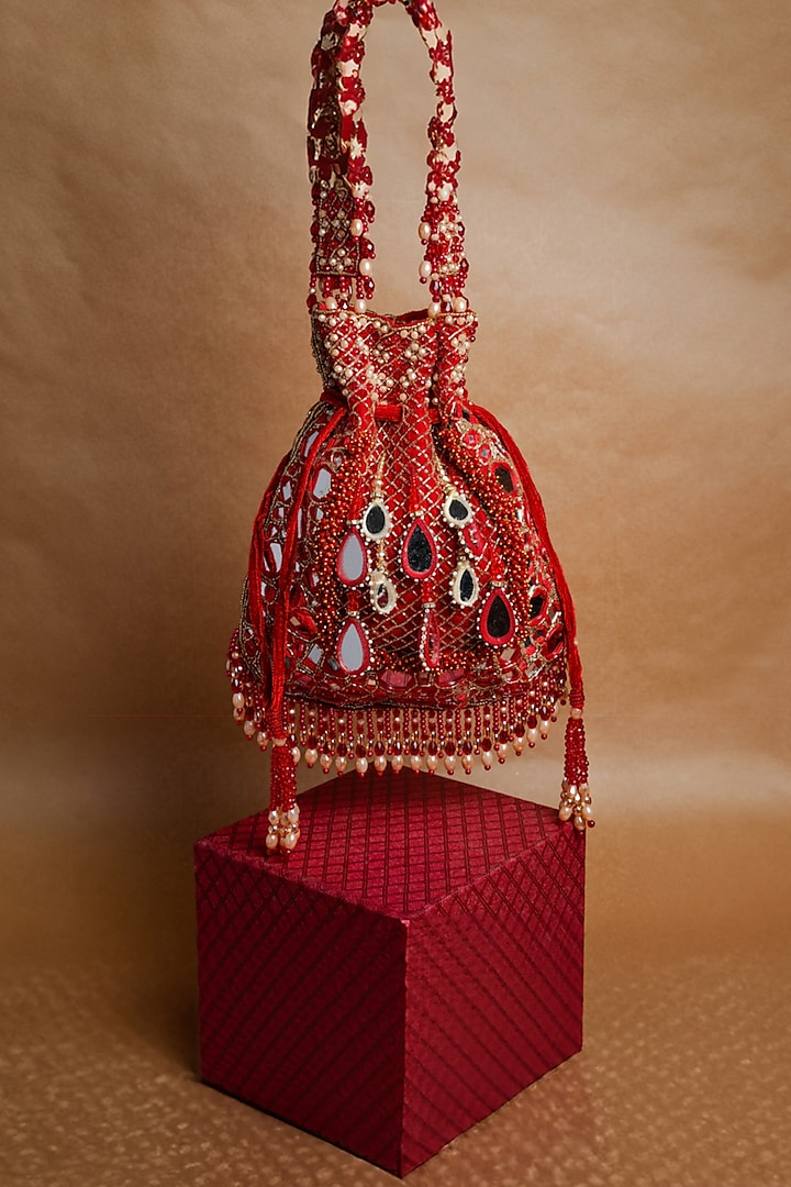 Red Silk Mirror Embroidered Potli Bag by Nayaab by Sonia at Pernia's Pop Up Shop